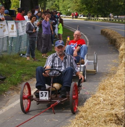 two carts being pulled by a rope